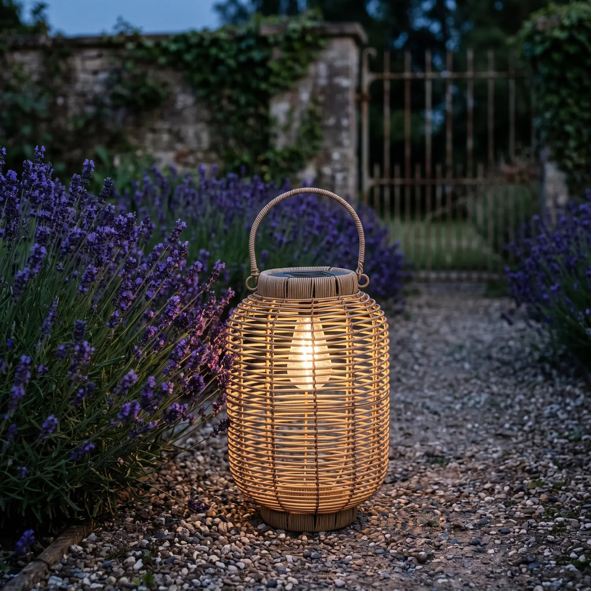 Solar Lantern Ø22.5 x H35 cm glowing on a lavender garden path at dusk